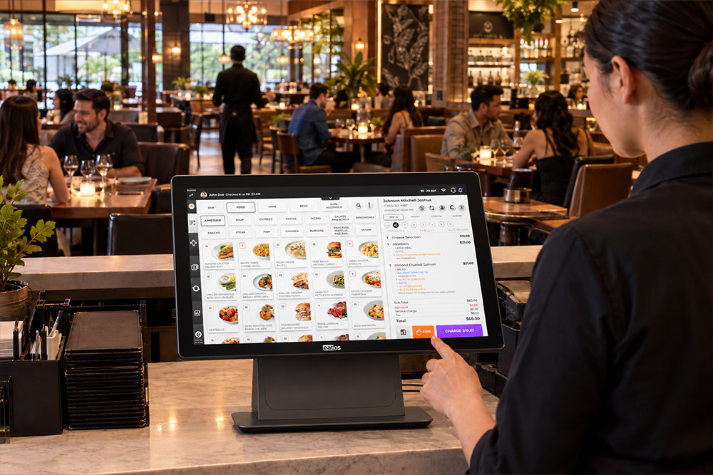 Staff taking an order on an eatOS Point of Sale terminal at a busy restaurant counter
